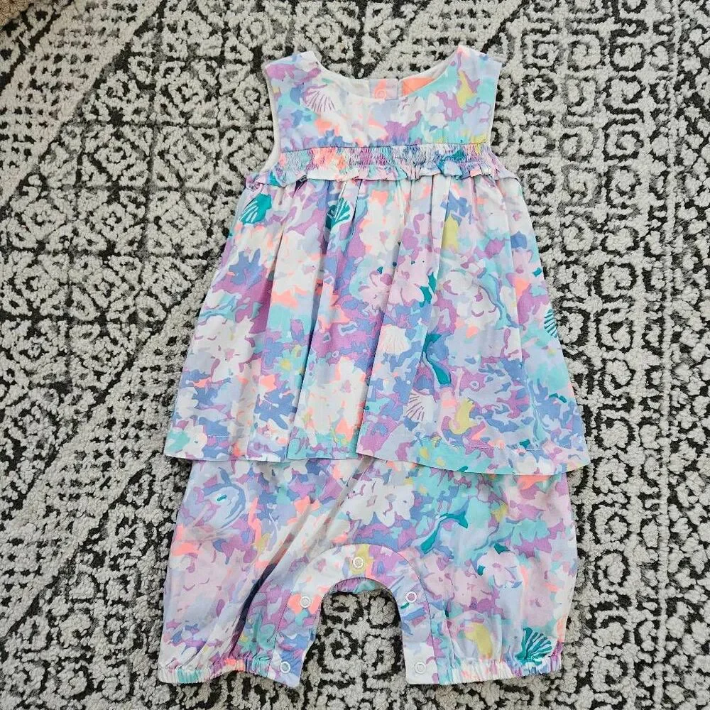Joules Baby Ruffle Romper in Bue and Purple Print Aize 12-18 Months